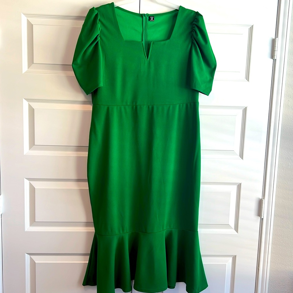Green theme dress with puff sleeves. Fun ruffle flare bottom. Blooming season